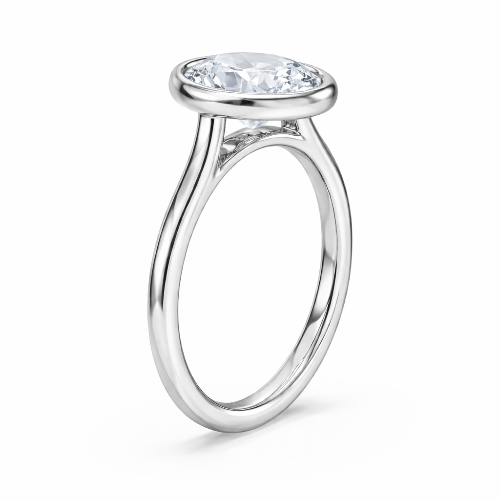 14K Bezel Set Oval Solitaire Size 7.